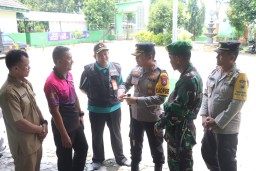 Kapolres Nganjuk Kunjungi Seluruh PPK Pastikan Penghitungan Suara Aman dan Lancar