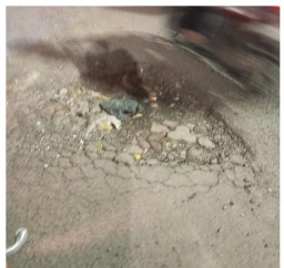 Jalan di Bulak Banteng Baru Arah Kelurahan Bulak Banteng Berlubang Parah Banget