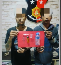 Unit Reskrim Polsek Krembangan Amankan Dua Pria Saat Asyik Nyabu di Sawah Pulo SR