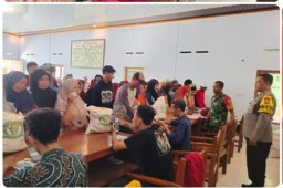 Wakapolres Nganjuk Pantau Penyaluran Bantuan Pangan di Tanjunganom