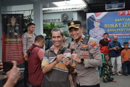 Bahagianya Kaum Difabel Dapat SIM Gratis dari Polres Jember di Hari Lalu Lintas Bhayangkara ke-70