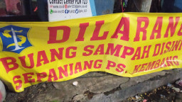 Warga Tempel Sukorejo Surabaya Beri Imbauan di Larang Buang Sampah Sembarangan