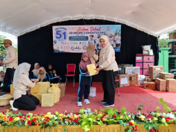 Semarak HUT ke-51, SDN 2 Babaktulung Gelar Jalan Sehat Bersama Warga